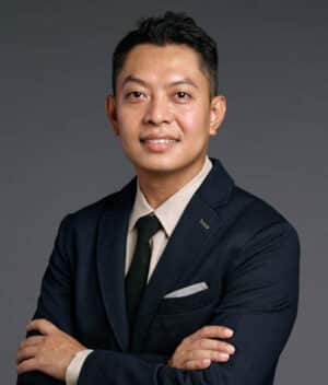 Portrait of Dr. Si Thura, CEO of Community Partners International