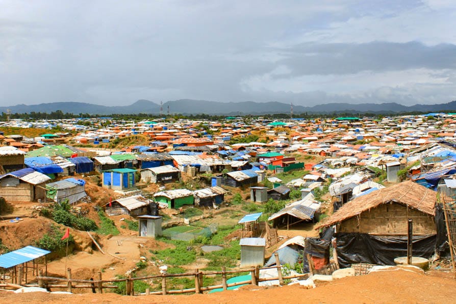 View from a hillside looking over hundreds of shelters in the valley below in Kutupalong Refugee Camp, Bangladesh.