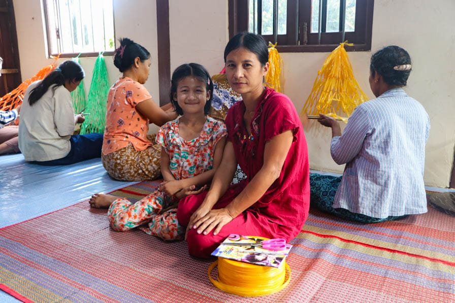 A woman sits with her daughter at a safe space for women and girls in southeastern Myanmar.