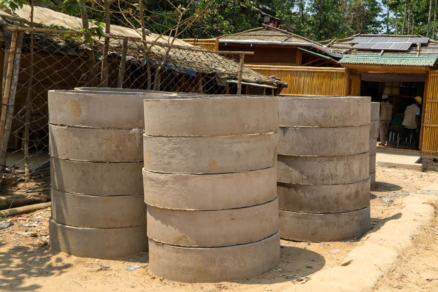 Stacks of concrete cesspit rings in Kutupalong Refugee Camp, Bangladesh.