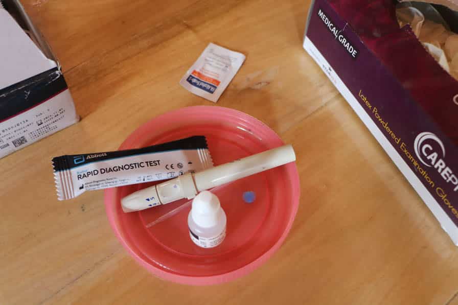 A malaria rapid diagnostic test kit on a table in Myanmar.