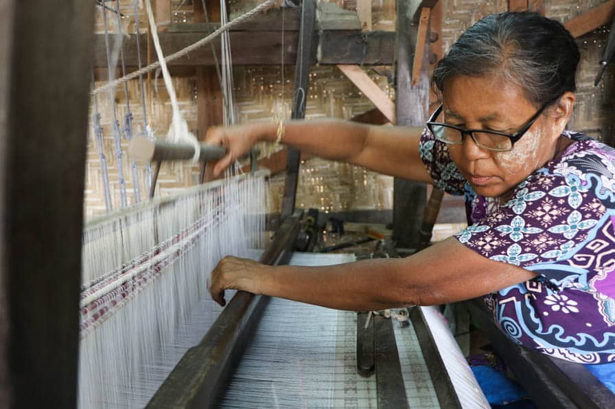 Handloom weaver, Daw Tin Tin Yi, at her loom in Amarapura, Myanmar.
