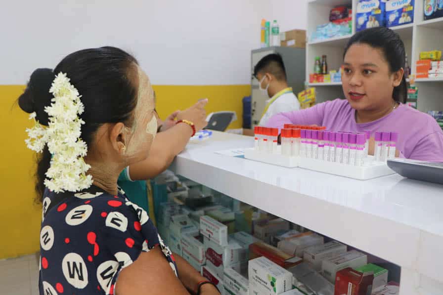 A patient visit the pharmacy at Nae Thit Kyan Mar's clinic in Amarapura, Myanmar.